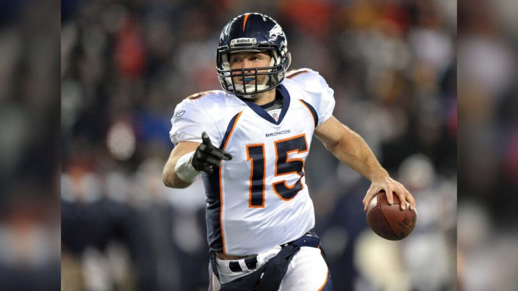 Jan 14, 2012, Foxborough, MA, USA; Denver Broncos quarterback Tim Tebow (15) is pressured by New England Patriots linebacker Rob Ninkovich in an AFC Divisional playoff game at Gillette Stadium. The Patriots defeated the Broncos 45-10.