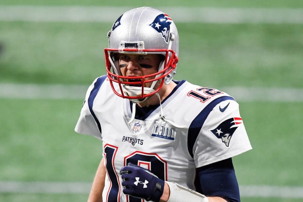 Feb 3, 2019; Atlanta, GA, USA; New England Patriots quarterback Tom Brady (12) yells before Super Bowl LIII between the New England Patriots and the Los Angeles Rams at Mercedes-Benz Stadium. 