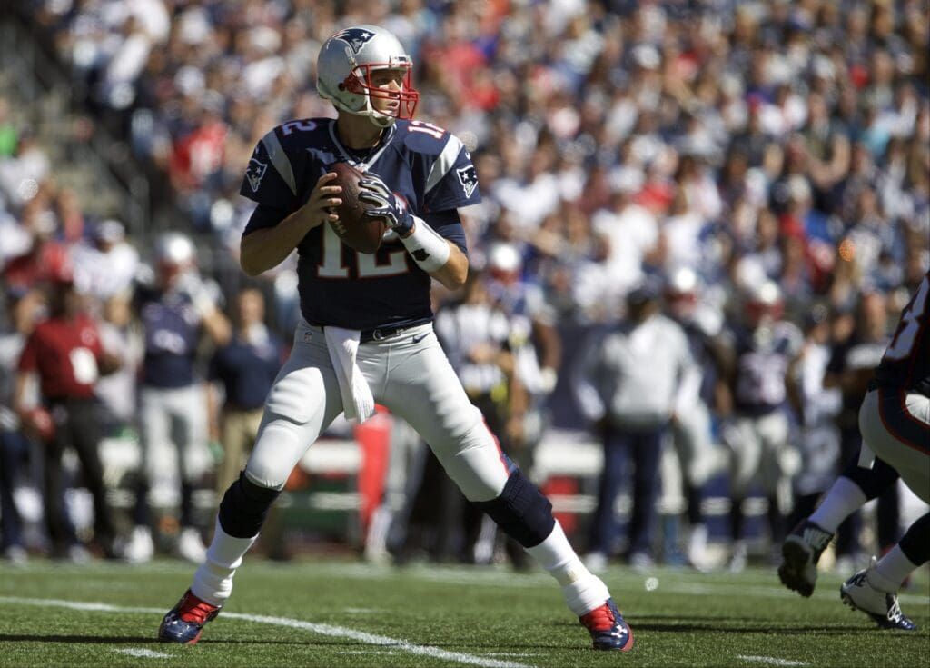 Sep 27, 2015; Foxborough, MA, USA; New England Patriots quarterback Tom Brady (12) looks to pass against the Jacksonville Jaguars in the first quarter at Gillette Stadium.