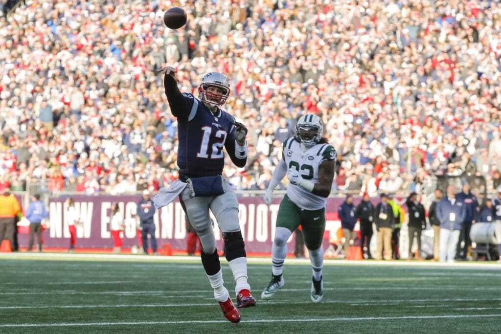 Dec 30, 2018; Foxborough, MA, USA; New England Patriots quarterback Tom Brady (12) throws a pass against the New York Jets in the first half at Gillette Stadium.