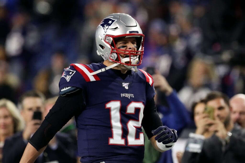 Oct 10, 2019; Foxborough, MA, USA; New England Patriots quarterback Tom Brady (12) reacts as he runs onto the field before a game against the New York Giants at Gillette Stadium