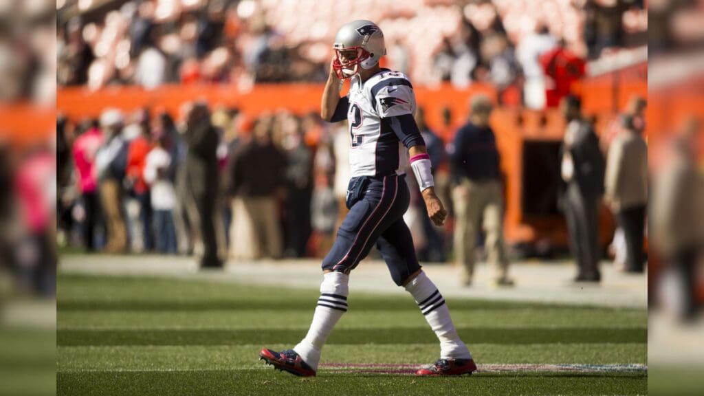 Oct 9, 2016; Cleveland, OH, USA; New England Patriots quarterback Tom Brady (12) walks on the field during warmups prior to the game against the Cleveland Browns at FirstEnergy Stadium.