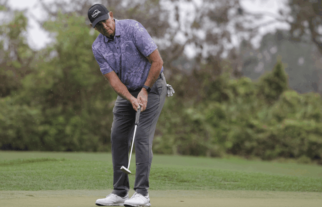 Dec 16, 2023; Orlando, Florida, USA; Tom Lehman watches his putt roll on the third green during the PNC Championship at The Ritz-Carlton Golf Club.