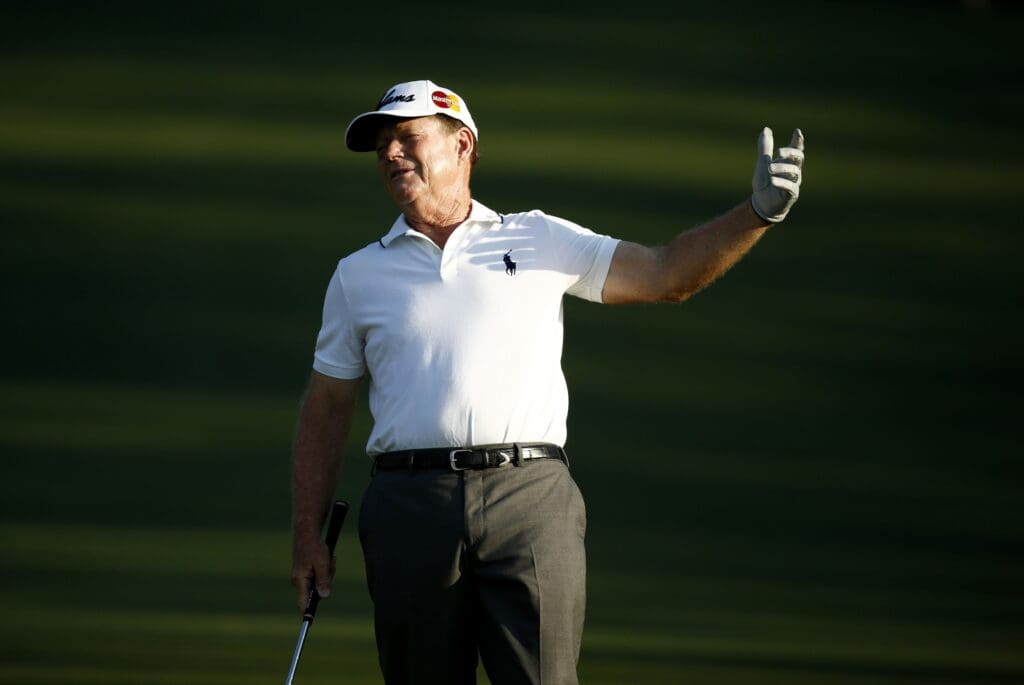 Apr 9, 2015; Augusta, GA, USA; Tom Watson reacts after just missing on holing his approach to the 2nd hole during the first round of The Masters golf tournament at Augusta National Golf Club.