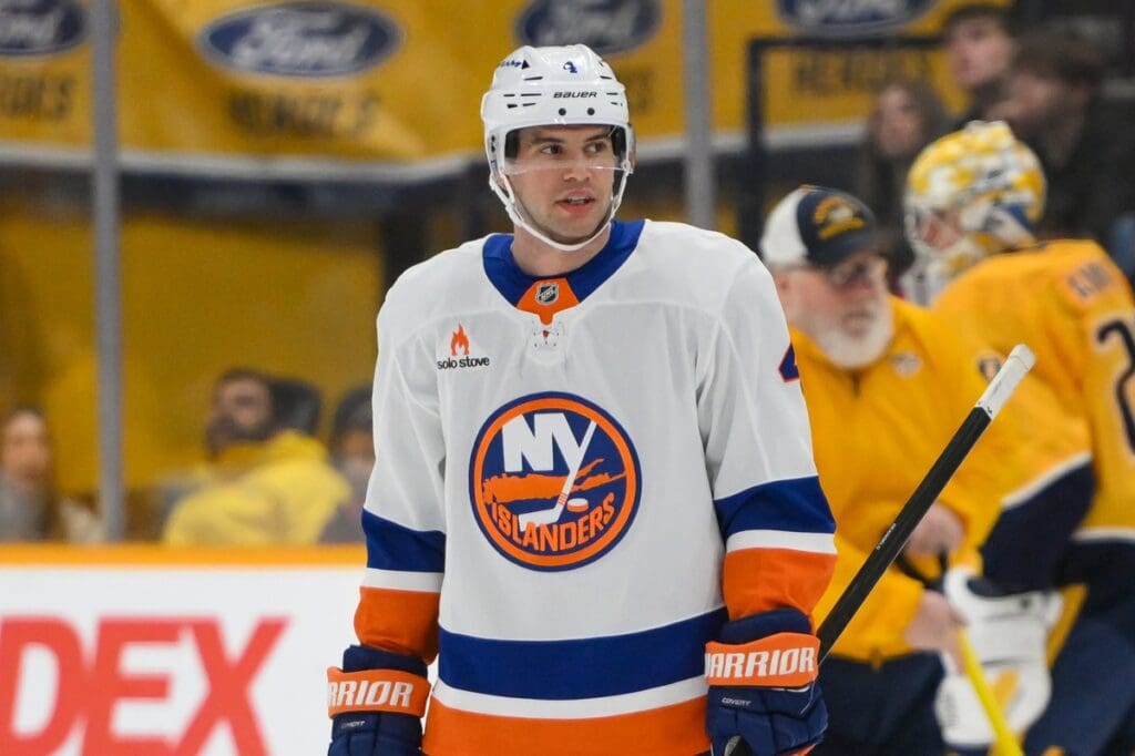 Apr 8, 2025; Nashville, Tennessee, USA; New York Islanders defenseman Tony DeAngelo (4) against the Nashville Predators during the first period at Bridgestone Arena.