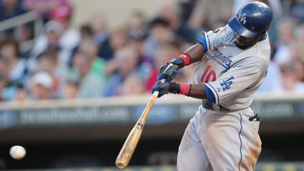 Jun, 27, 2011; Minneapolis, MN, USA: Los Angeles Dodgers left fielder Tony Gwynn (10) hits a single in the forth inning against the Minnesota Twins at Target Field. The Dodgers won 15-0.