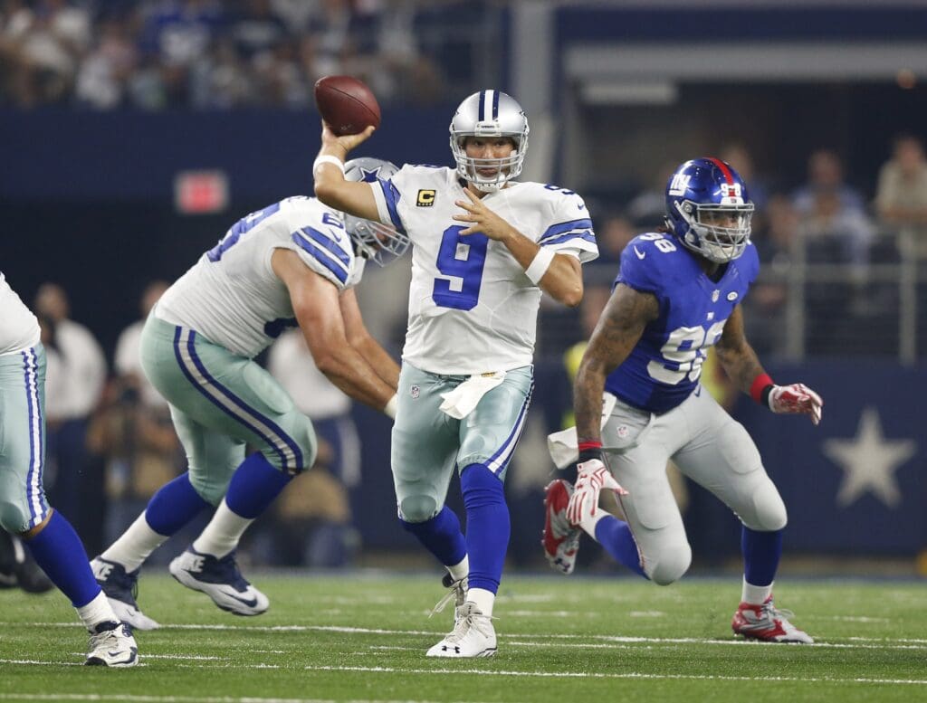 Sep 13, 2015; Arlington, TX, USA; Dallas Cowboys quarterback Tony Romo (9) throws in the pocket against the New York Giants at AT&T Stadium.