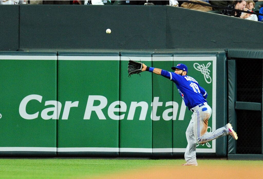 May 20, 2017; Baltimore, MD, USA; Toronto Blue Jays outfielder Jose Bautista (19) catches a fly ball in the second inning against the Baltimore Orioles at Oriole Park at Camden Yards. 