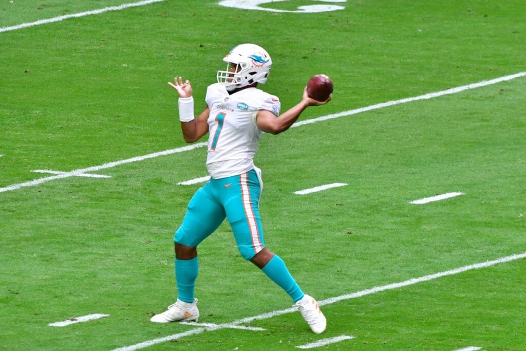 Nov 8, 2020; Glendale, Arizona, USA; Miami Dolphins quarterback Tua Tagovailoa (1) warms up prior to the game against the Arizona Cardinals at State Farm Stadium.