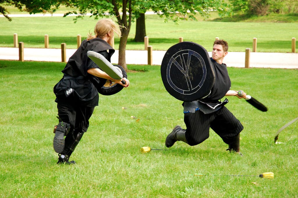 Two Dagorhir fighters use foam weapons to duel.