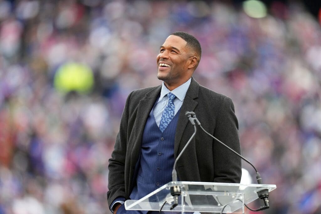 Sep 18, 2022; East Rutherford, NJ, USA; New York Giants former player Michael Strahan reacts at his jersey retirement ceremony at halftime of a game against the Carolina Panthers at MetLife Stadium. Mandatory Credit: Danielle Parhizkaran-USA TODAY Sports