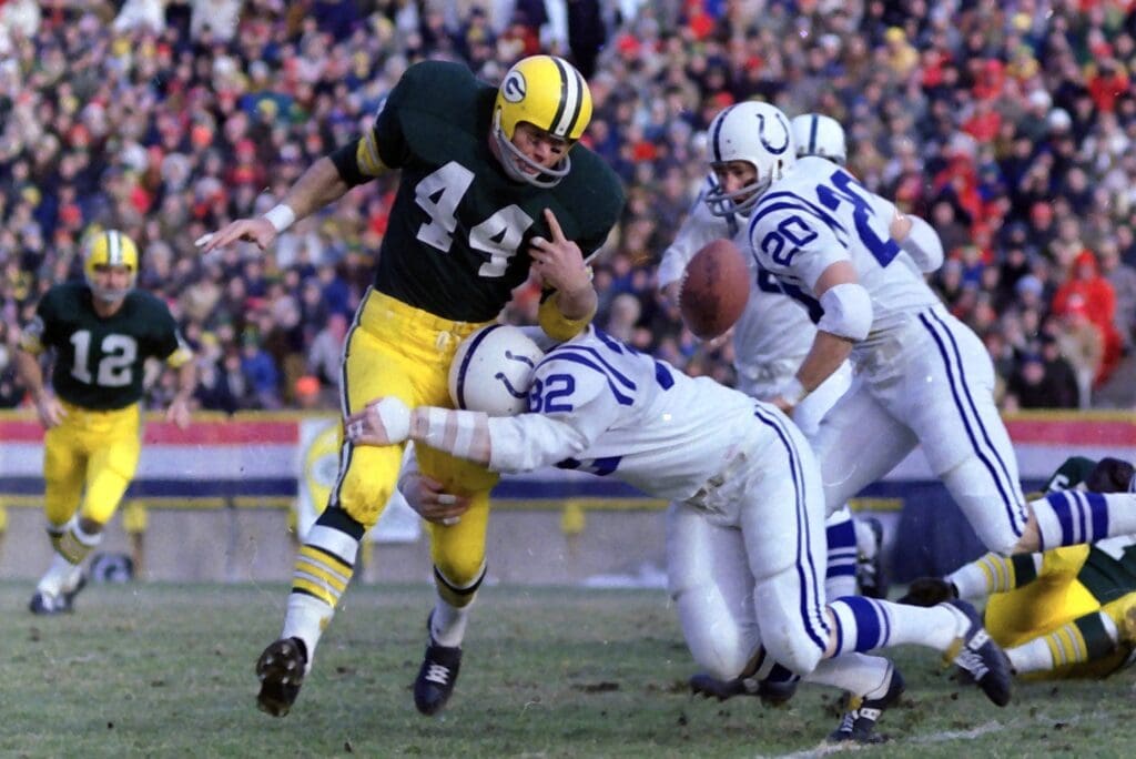 The ball is knocked out of the hands of Green Bay Packers running back Donny Anderson (44) by linebacker Mike Curtis (32) on Dec. 7, 1968, at Lambeau Field in Green Bay, Wis. The Baltimore (now Indianapolis) Colts defeated the Packers 16-3.
Gpg Packers Archive Series 11072022 0003