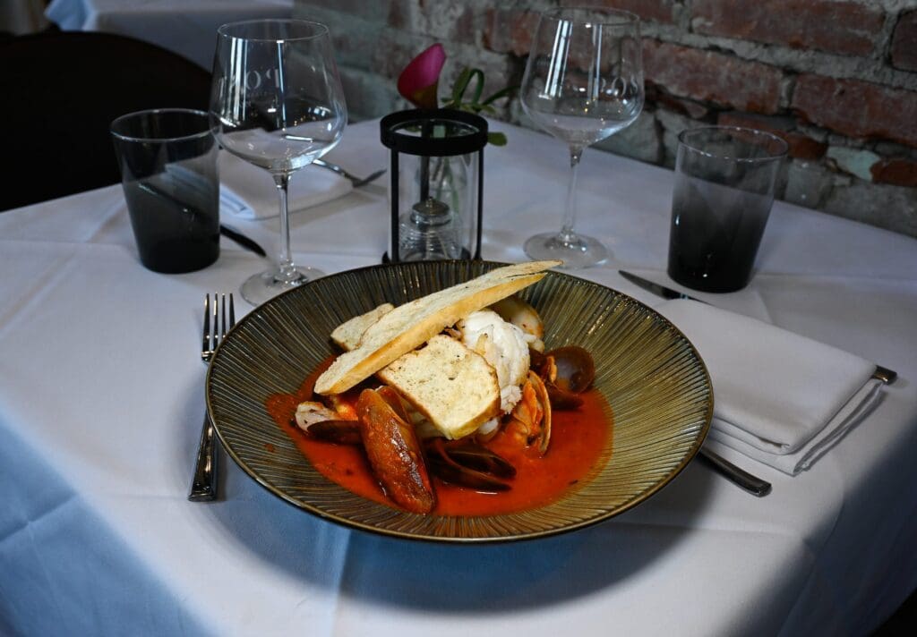 A bowl of cioppino, an Italian-American fisherman's stew, at Post 1917, an upscale steakhouse located in the historic Reading Post Office building, Tuesday, May 14, 2024.