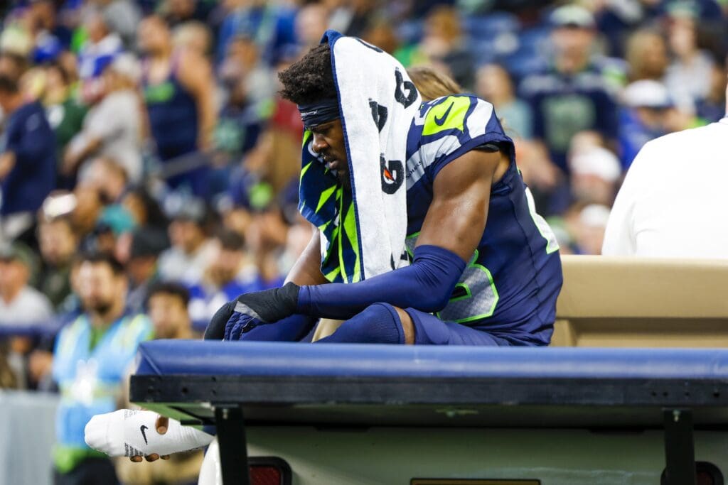 Aug 24, 2024; Seattle, Washington, USA; Seattle Seahawks cornerback Artie Burns (23) rides a cart to the locker room following an injury during the second quarter against the Cleveland Browns at Lumen Field. Mandatory Credit: Joe Nicholson-USA TODAY Sports