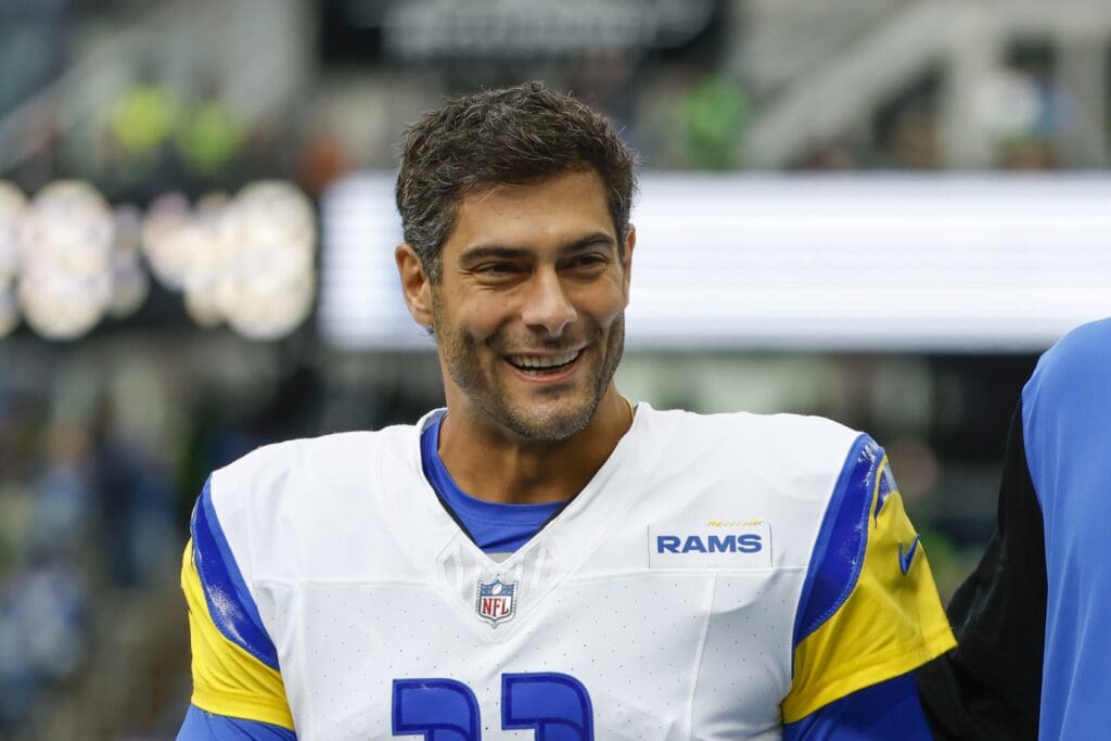 Nov 3, 2024; Seattle, Washington, USA; Los Angeles Rams quarterback Jimmy Garoppolo (11) walks to the locker room following pregame warmups against the Seattle Seahawks at Lumen Field. Mandatory Credit: Joe Nicholson-Imagn Images