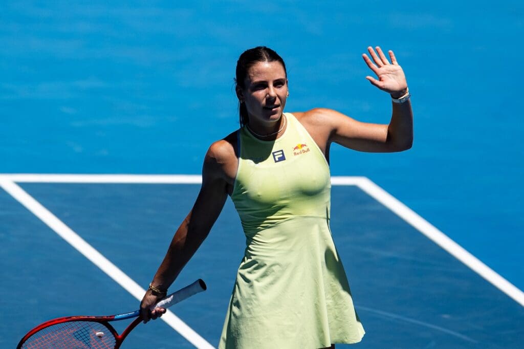 Jan 18, 2025; Melbourne, Victoria, Australia; Emma Navarro of United States of America celebrates during her match against Ons Jabeur of Tunisia in the third round of the women's singles at the 2025 Australian Open at Melbourne Park. Mandatory Credit: Mike Frey-Imagn Images