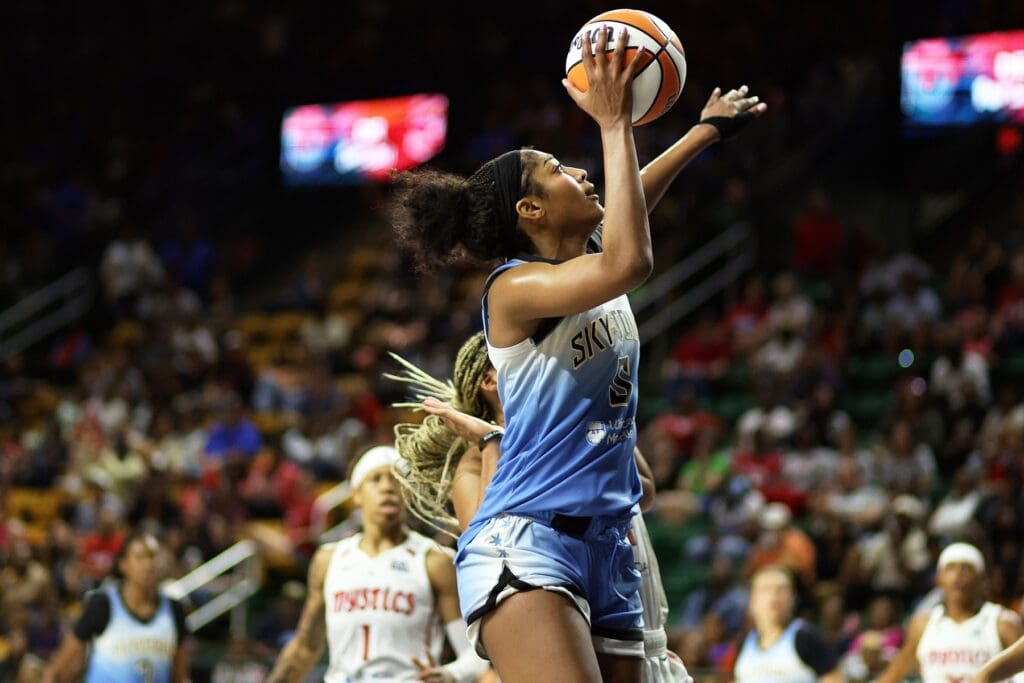 Jul 8, 2025; Fairfax, Virginia, USA; Chicago Sky forward Angel Reese (5) takes a shot during the second half against the Washington Mystics at EagleBank Arena. Mandatory Credit: Daniel Kucin Jr.-Imagn Images
