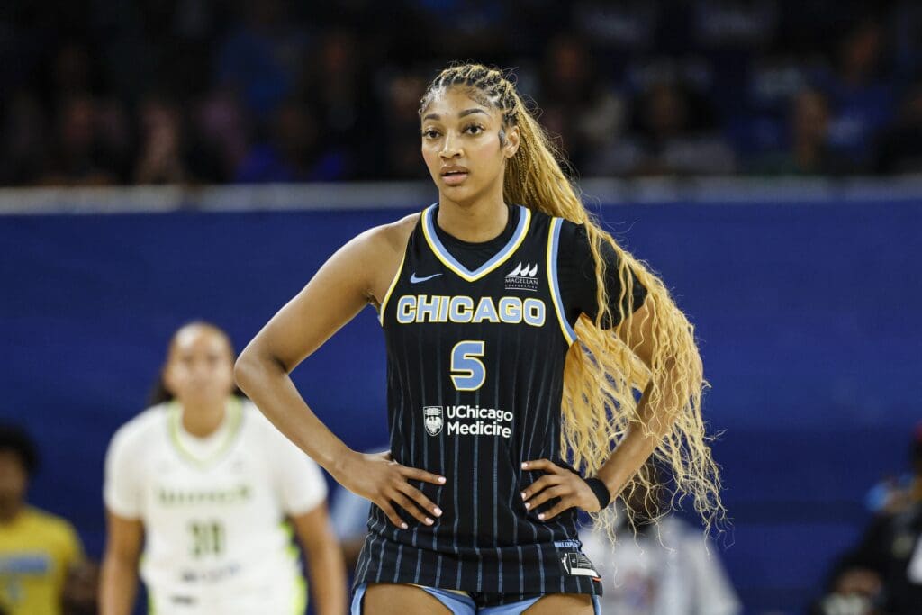 Jul 9, 2025; Chicago, Illinois, USA; Chicago Sky forward Angel Reese (5) stands on the court during the first half of a WNBA game against the Dallas Wings at Wintrust Arena. Mandatory Credit: Kamil Krzaczynski-Imagn Images