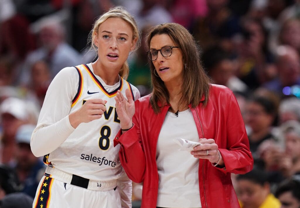 Jul 15, 2025; Boston, Massachusetts, USA; Indiana Fever head coach Stephanie White talks with guard Sophie Cunningham (8) from the sideline as they take on the Connecticut Sun at TD Garden. Mandatory Credit: David Butler II-Imagn Images