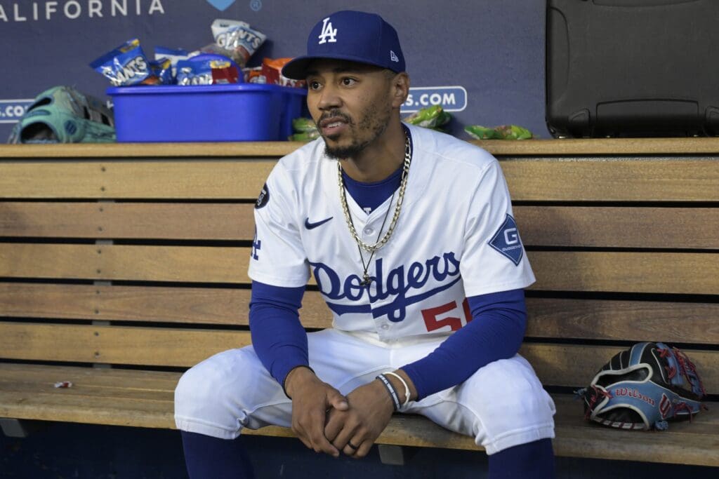 Jul 22, 2025; Los Angeles, California, USA; Los Angeles Dodgers shortstop Mookie Betts (50) in the dugout prior to the first inning of the game against the Minnesota Twins at Dodger Stadium. Mandatory Credit: Jayne Kamin-Oncea-Imagn Images