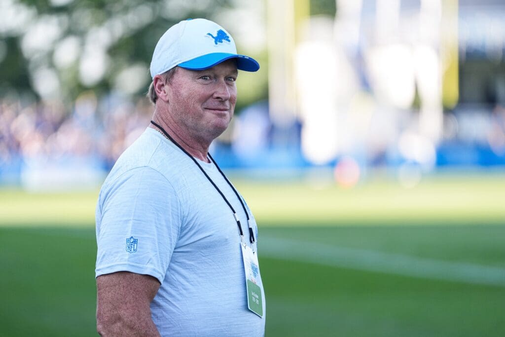 Jon Gruden watches practice during training camp at Meijer Performance Center in Allen Park on Monday, July 28, 2025.