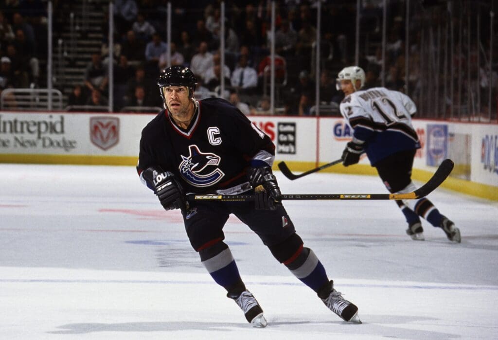 Oct 21, 1998; Washington, DC, USA; FILE PHOTO; Vancouver Canucks center Mark Messier (11) in action against the Washington Capitals at the MCI Center.