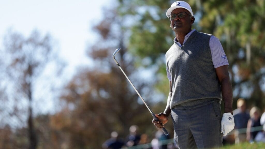 Dec 22, 2024; Orlando, Florida, [USA]; Vijay Singh looks to hit a shot out of a bunker on the seventh hole during the PNC Championship at The Ritz-Carlton Golf Club. 