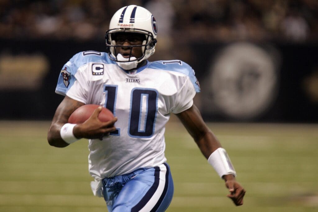 Sept 24, 2007; New Orleans, LA, USA; Tennessee Titans quarterback Vince Young (10) scrambles against the New Orleans Saints during the first half at the Louisiana Superdome.