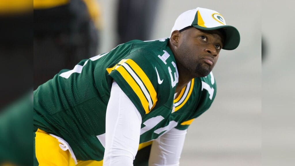 Aug 9, 2013; Green Bay, WI, USA; Green Bay Packers quarterback Vince Young (13) during the game against the Arizona Cardinals at Lambeau Field. The Cardinals won 17-0.