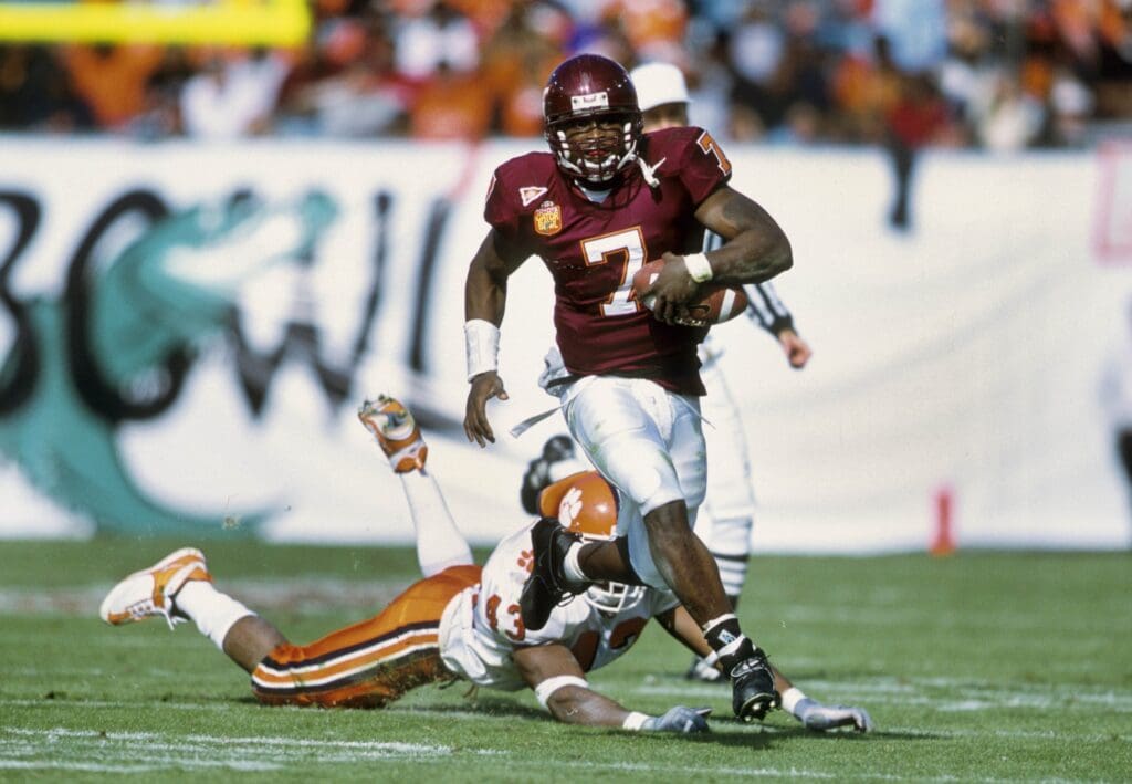 Jan 1, 2001; Jacksonville, FL, USA: FILE PHOTO; Virginia Tech Hokies quarterback Michael Vick (7) in action against the Clemson Tigers during the 2001 Gator Bowl at Alltel Stadium.