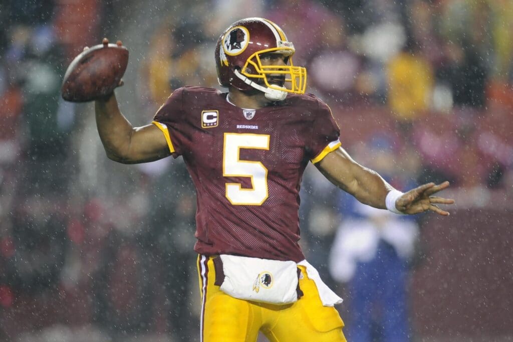 Nov 15, 2010; Landover, MD, USA; Washington Redskins quarterback Donovan McNabb (5) drops back to pass against the Philadelphia Eagles during the second half at FedEx Field.