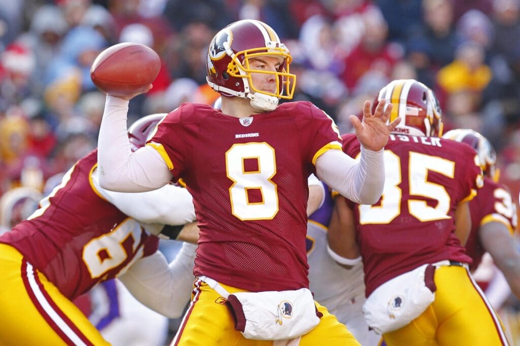December 24, 2011; Landover, MD, USA; Washington Redskins quarterback Rex Grossman (8) throws the ball against the Minnesota Vikings in the second quarter at FedEx Field. 