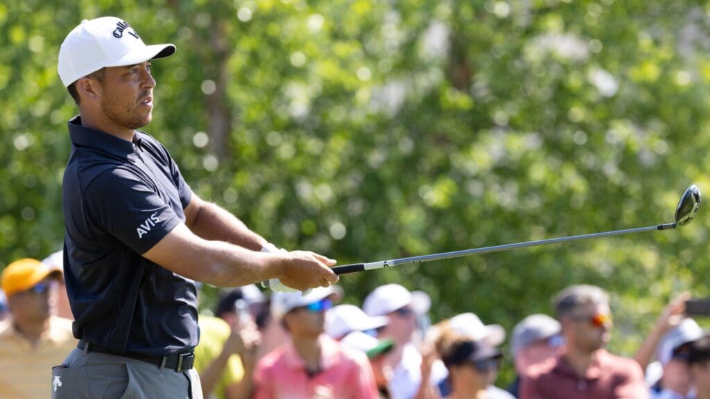Jun 20, 2025; Cromwell, Connecticut, USA; Xander Schauffele plays his shot from the first tee during the second round of the Travelers Championship golf tournament.