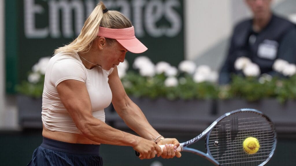 May 31, 2025; Paris, FR; Yulia Putintseva of Kazakhstan returns a shot during her match against Mirra Andreeva on day seven at Roland Garros Stadium
