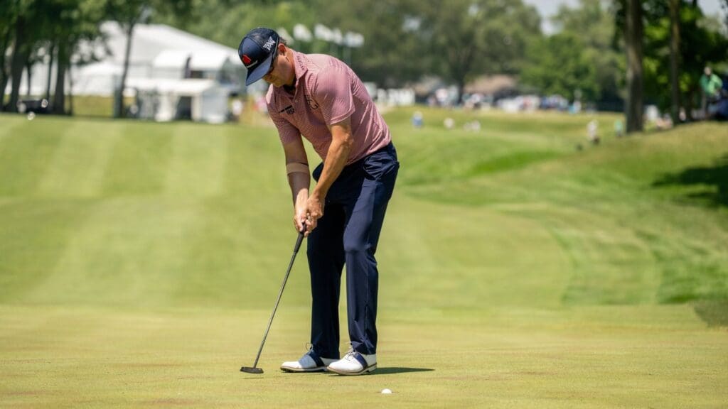 Jul 4, 2025; Silvis, Illinois, USA; Zach Johnson sinks his putt on the 9th hole during the second round of the John Deere Classic golf tournament.