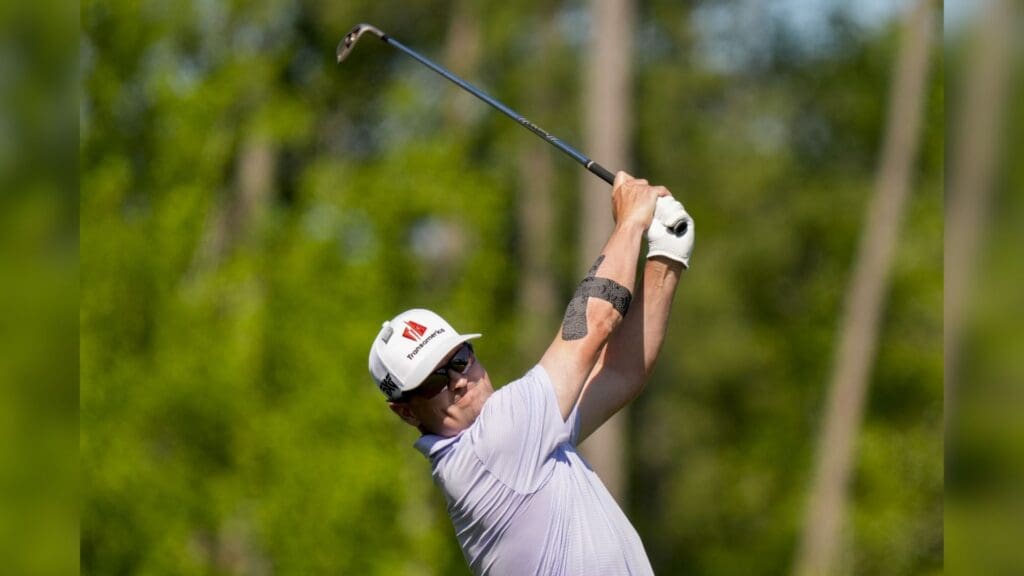Apr 13, 2025; Augusta, Georgia, USA; Zach Johnson tees off on no. 12 during the final round of the Masters Tournament at Augusta National Golf Club.