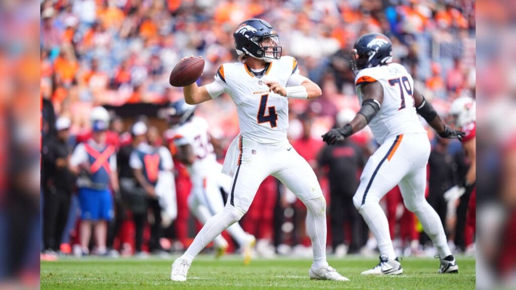 Aug 25, 2024; Denver, Colorado, USA; Denver Broncos quarterback Zach Wilson (4) prepares to pass in the second quarter against the Arizona Cardinals at Empower Field at Mile High.