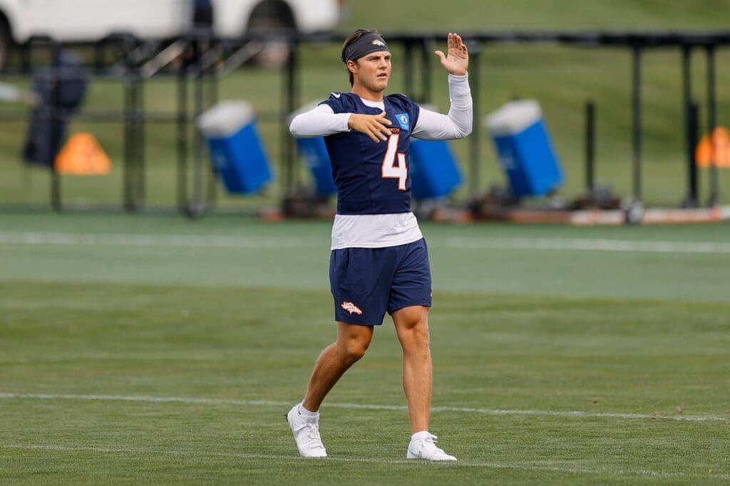 Jul 26, 2024; Englewood, CO, USA; Denver Broncos quarterback Zach Wilson (4) during training camp at Broncos Park Powered by CommonSpirit.