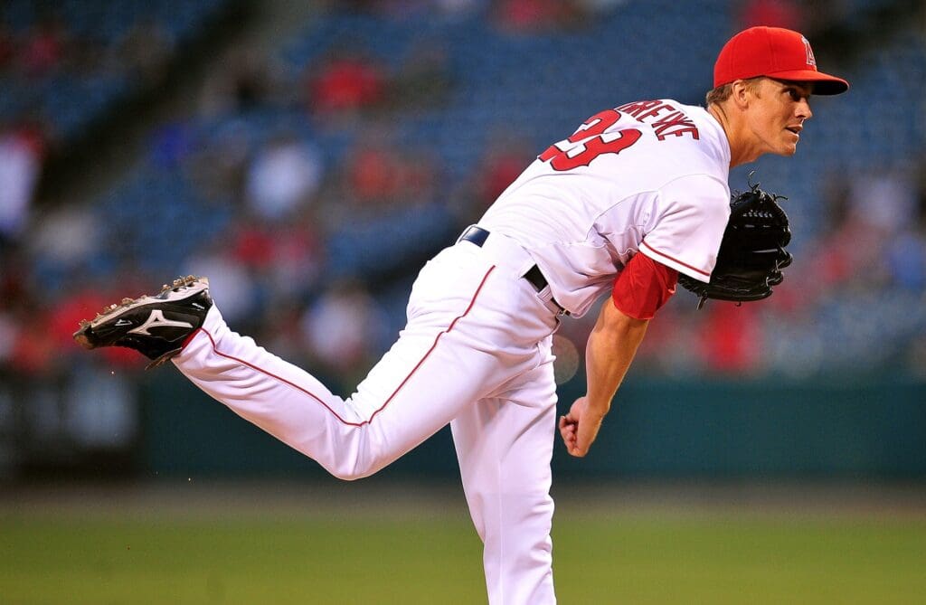 August 14, 2012; Anaheim, CA, USA; Los Angeles Angels starting pitcher Zack Greinke (23) pitches in the second inning against the Cleveland Indians at Angel Stadium. 