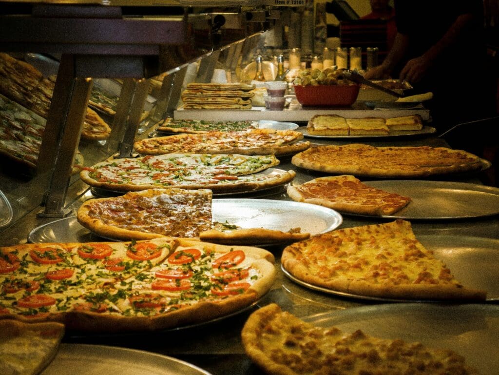 New York pizzas on trays