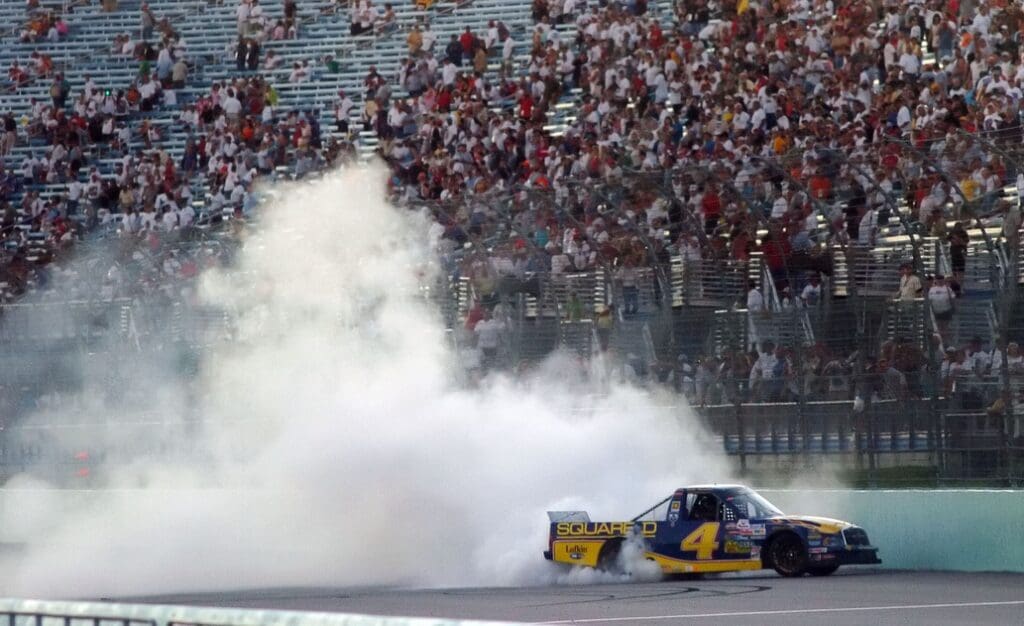 Nov 19, 2004; Homestead, FL, USA; Nascar Craftsman Truck Series driver (4) Bobby Hamilton celebrates after clinching the 2004 Nascar Craftsman Truck Series championship following the Ford 200 at Homestead Miami Speedway