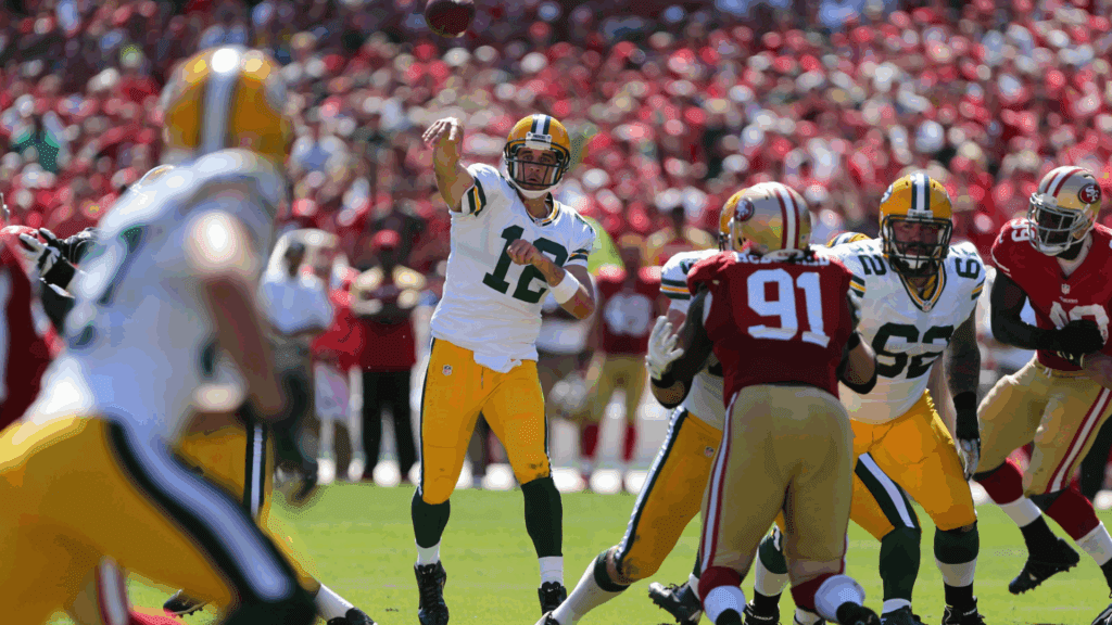 Sep 8, 2013; San Francisco, CA, USA; Green Bay Packers quarterback Aaron Rodgers (12) passes the ball against the San Francisco 49ers during the second quarter at Candlestick Park.