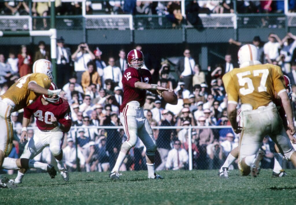 Oct 21, 1967; Birmingham, AL, USA FILE PHOTO; Alabama Crimson Tide quarterback Ken Stabler (12) sets to throw against the Tennessee Volunteers at Legion Field. Tennessee defeated Alabama 24-13.