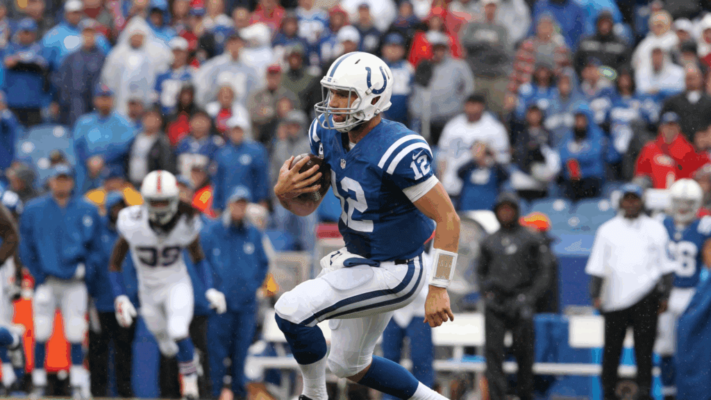 Sep 13, 2015; Orchard Park, NY, USA; Indianapolis Colts quarterback Andrew Luck (12) runs the ball during the second half against the Buffalo Bills at Ralph Wilson Stadium. Bills beat the Colts 27 to 14.