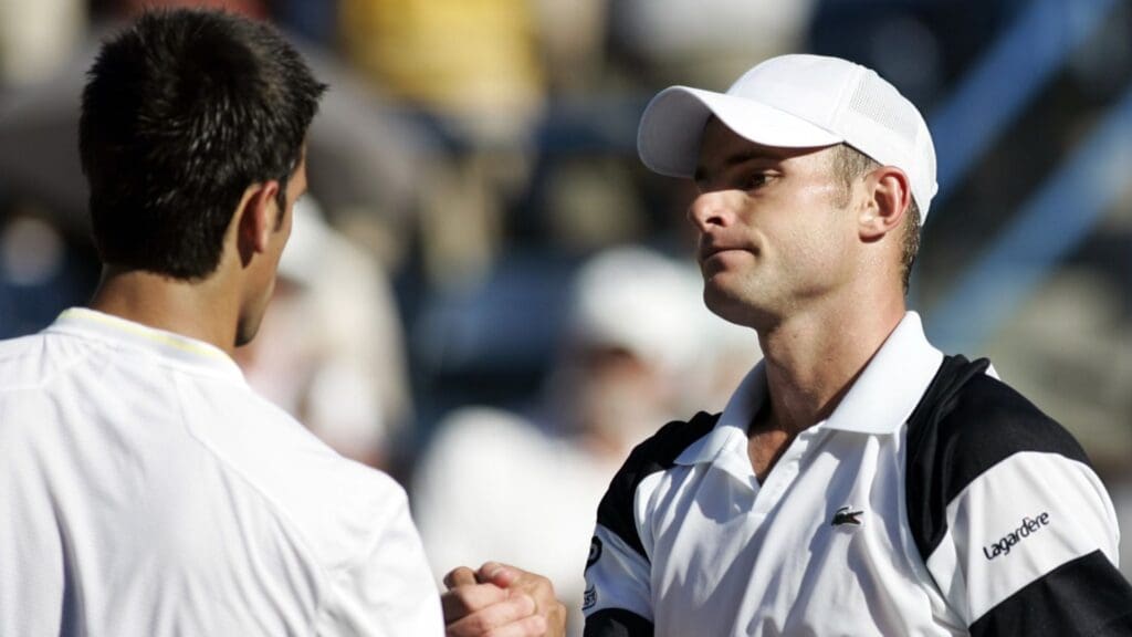 Andy Roddick (USA), right, shakes hands with Novak Djokovic (SRB)