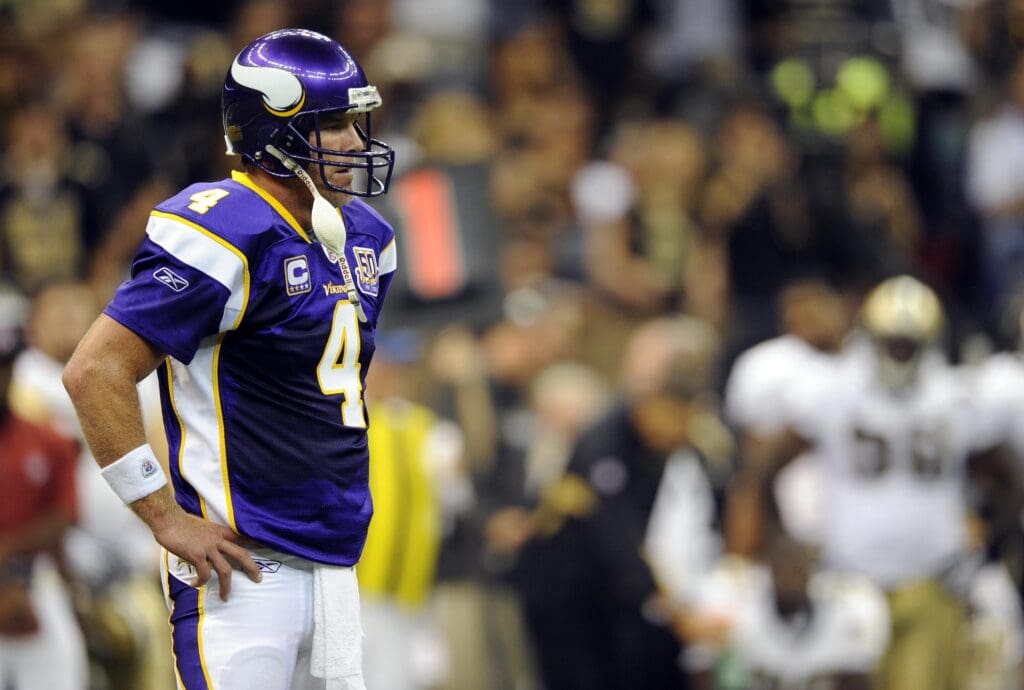 September 9, 2010; New Orleans, LA, USA; Minnesota Vikings quarterback Brett Favre (4) takes a breather between downs against the New Orleans Saints during the first half at the Louisiana Superdome.