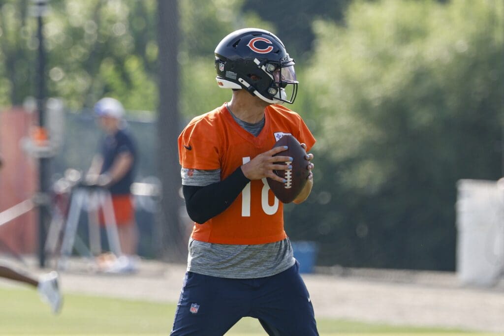 Jul 23, 2025; Lake Forest, IL, USA; Chicago Bears quarterback Caleb Williams (18) looks to pass the ball during training camp at Halas Hall. 