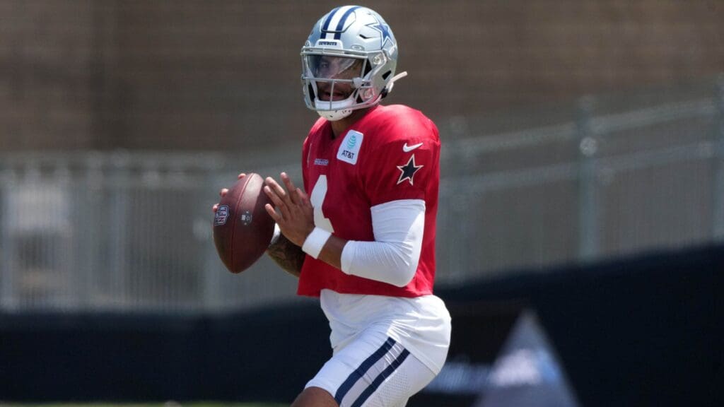 Jul 27, 2025; Oxnard, CA, USA; Dallas Cowboys quarterback Dak Prescott (4) throws the ball at training camp at the River Ridge Fields.