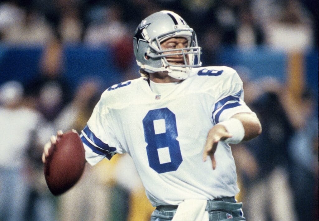 Jan 30, 1994; Atlanta, GA, USA; FILE PHOTO; Dallas Cowboys quarterback Troy Aikman (8) prepares to throw against the Buffalo Bills during Super Bowl XXVIII at the Georgia Dome. The Cowboys defeated the Bills 30-13.