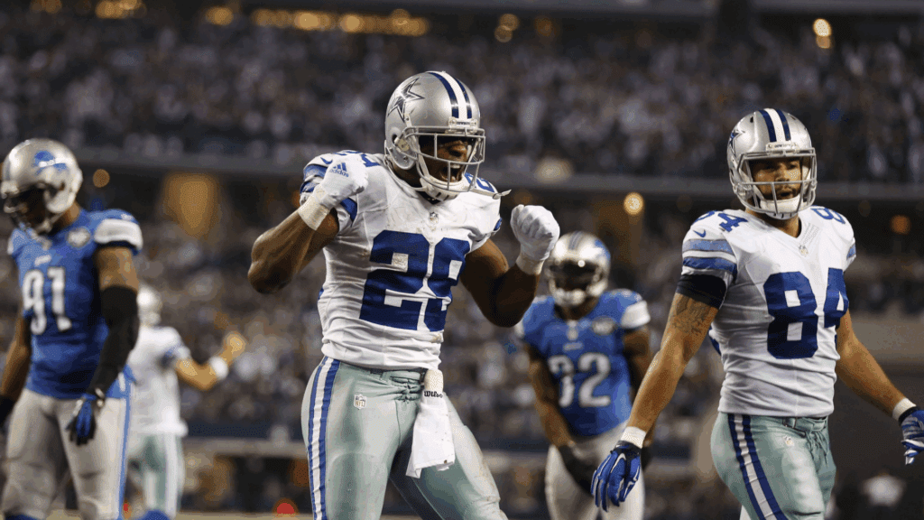 Jan 4, 2015; Arlington, TX, USA; Dallas Cowboys running back DeMarco Murray (29) reacts after scoring a touchdown against the Detroit Lions during the third quarter in the NFC Wild Card Playoff Game at AT&T Stadium. 
